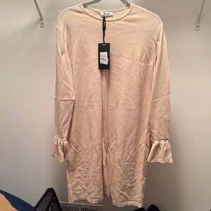 Chic Cream Tunic with Ruffle Sleeves